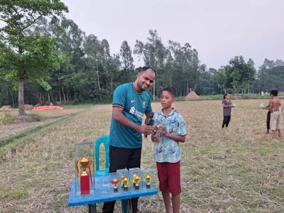 I love spending quality time with children. In 2025, I organized a football tournament for the children in my village to bring them together and let them simply enjoy being kids. For fun, I even shaved all the players' heads(including myself, though I didn't play) to make them feel like professional footballers. Each team included both boys and girls because I wanted them to grow up knowing that joy, teamwork, and opportunity should never depend on gender.