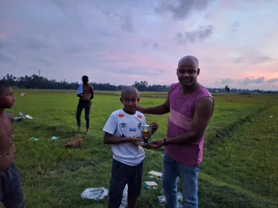 In 2024, I organized a football tournament for the children in my village with one simple goal—to give them joyful memories while encouraging teamwork, confidence, and healthy competition.

Like every year, the children came to me and asked if we could organize another tournament. This time, I made them a fun challenge: every player had to shave their head before joining the match. Without hesitation, they all agreed, and to make it even more memorable, I shaved my own head alongside them. It became a moment of laughter, excitement, and unity that none of us will ever forget.

I fully sponsored the entire event and organized matches for both boys and girls. Four girls participated, playing across two different teams. Their participation carried an important message: when it comes to learning, growing, and enjoying life, there should be no gender discrimination. Everyone deserves an equal opportunity to play, compete, and create unforgettable childhood memories.

Seeing the smiles on their faces reminded me that sometimes the smallest initiatives can leave the biggest impact on a community.