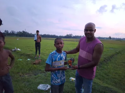 In 2024, I organized a football tournament for the children in my village with one simple goal—to give them joyful memories while encouraging teamwork, confidence, and healthy competition.

Like every year, the children came to me and asked if we could organize another tournament. This time, I made them a fun challenge: every player had to shave their head before joining the match. Without hesitation, they all agreed, and to make it even more memorable, I shaved my own head alongside them. It became a moment of laughter, excitement, and unity that none of us will ever forget.

I fully sponsored the entire event and organized matches for both boys and girls. Four girls participated, playing across two different teams. Their participation carried an important message: when it comes to learning, growing, and enjoying life, there should be no gender discrimination. Everyone deserves an equal opportunity to play, compete, and create unforgettable childhood memories.

Seeing the smiles on their faces reminded me that sometimes the smallest initiatives can leave the biggest impact on a community.